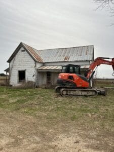 An old shed/barn ready to be demolished by Roll Off Solutions